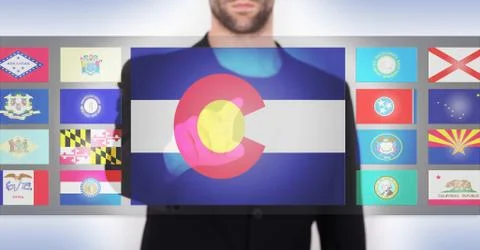 Hand pushing on a touch screen interface Illustrazione stock