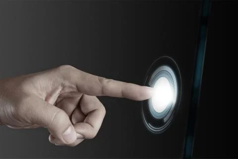 Hand pushing on a touch screen interface Stock Photos