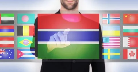 Hand pushing on a touch screen interface 写真素材