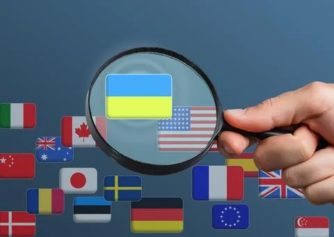 Hand pushing on a touch screen interface, choosing Ukraine. flags of the world Stock Photos