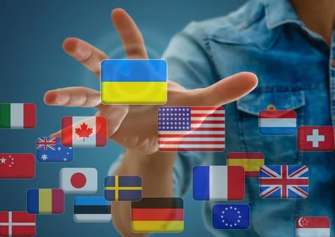 Hand pushing on a touch screen interface, choosing Ukraine. flags of the world Stock Photos