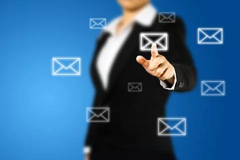 Hand pushing virtual mail button on digital background Stock Photos