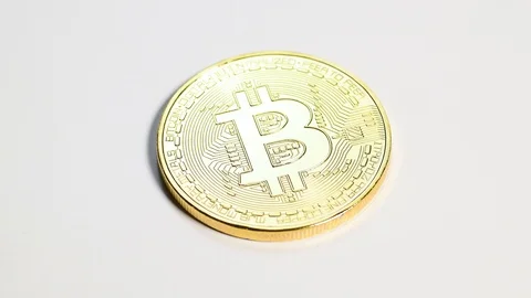 Hand put bitcoin coin on table Stock Footage 109272728