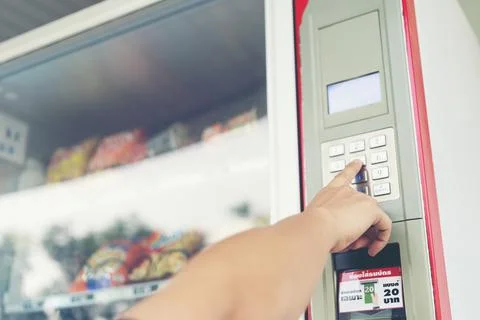 The hand put button Automatic machine food purchase kiosk Stock Photos