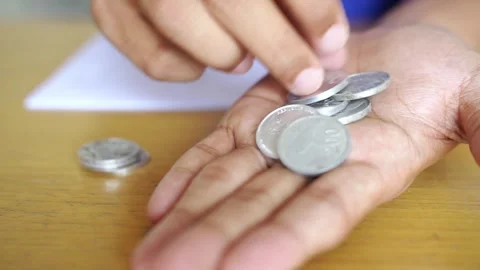 Hand put coin to stack, investment concept Stock Footage 322144479