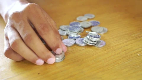 Hand put coin to stack, investment concept Stock Footage 322144525
