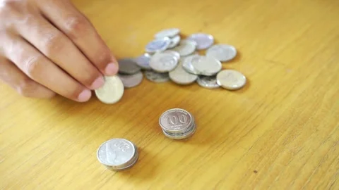 Hand put coin to stack, investment concept Stock Footage 322144526