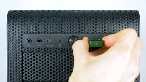 Hand that put a pendrive into usb port Stock Footage 87198462