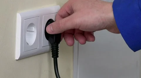 Hand Put Plug Into Electricity Socket Stock Footage 65106826