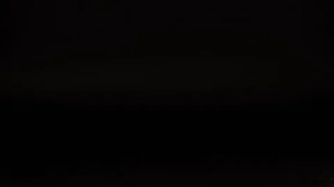 Hand puts on a black background a bottle of milk and a plate of yogurt 스톡 동영상 119791416