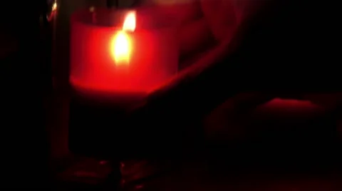 Hand puts a candle on the table Stock Footage 68659317