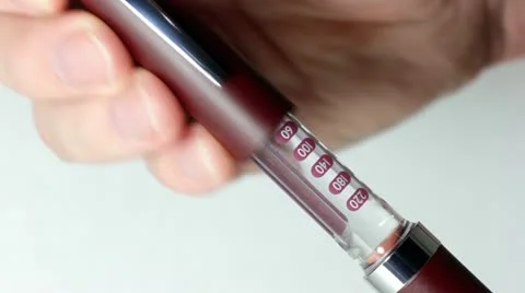 The hand puts cap on pen Stock Footage