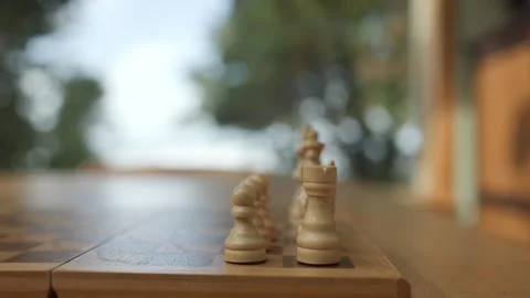 Hand Puts A Chess Piece Pawn On The Chessboard - Close Up Stock Footage 320886243