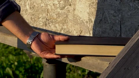The hand puts down and takes up the book 4K Stock Footage 325988504