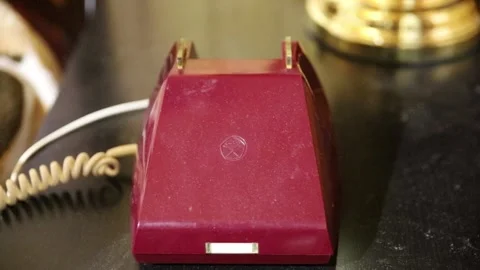 A hand puts down soviet vintage phone Stock Footage 168575131