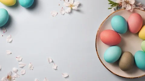 Hand puts a greeting card on the easter decorated table. Stock Footage 126246273