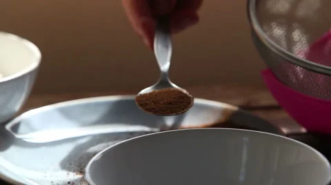 Hand puts malt powder with spoon closeup Stock Footage 48211752