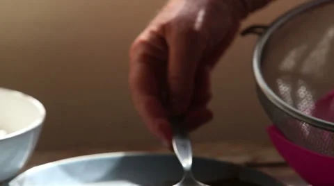 Hand puts malt powder with spoon closeup Stock Footage 48441270
