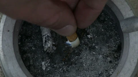 Hand puts out a cigarette Stock Footage 36527750