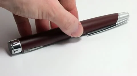 Hand puts the pen Vídeo Stock 12208909