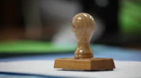 Hand that puts a stamp in the contract Stock Footage 57808779