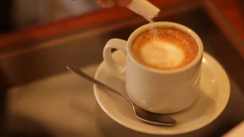  hand puts sugar inside the cafe on a wooden bar table 스톡 동영상 123799577
