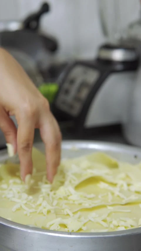 Hand putting cheese Видео 246241641