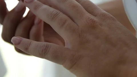 Hand putting on engagement ring close up Stock-Footage 107247206