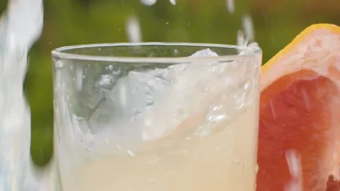 Hand putting a glass on the table Stock Footage 141601346
