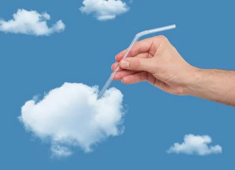 Hand putting a straw in a puffy cloud Stock Photos