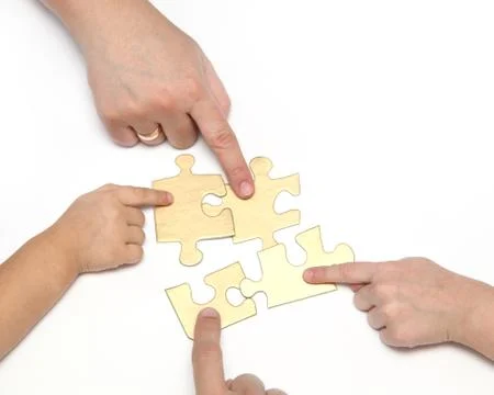 Hand with puzzle Stock Photos