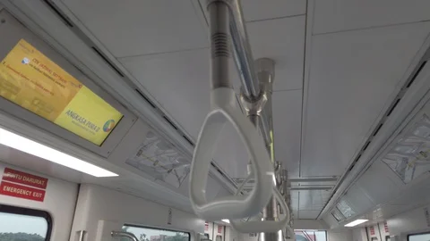 Hand Rail Inside Train Compartment Skytrain Cabin, Soekarno Hatta Airport Stock Footage 129900666