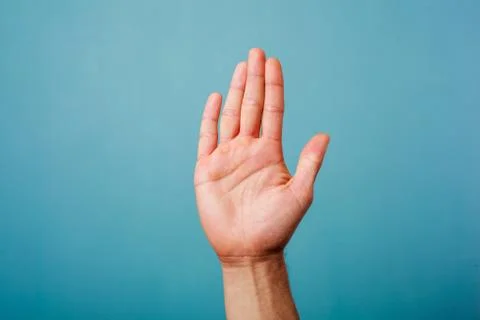 Hand raised Stock Photos