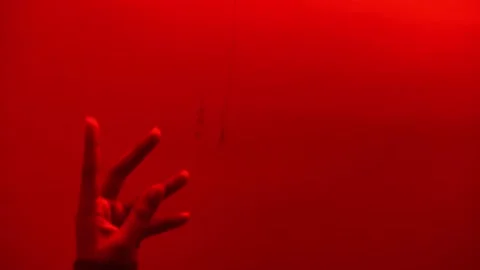 Hand raising in the red colour Video stock 233263484