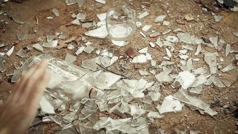 Hand reaches for bottle of vodka Video stock 80759893