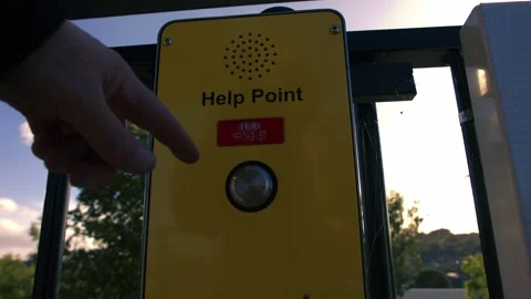 Hand reaches for help button in emergency Video stock 346042247