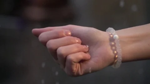 Hand Reaches Out in Falling Snow Stock Footage 80321721