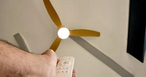 A hand reaches out to switch on the light. Stock Footage 337930672