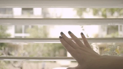 Hand reaching and closing window shutters. Stock Footage 129114805