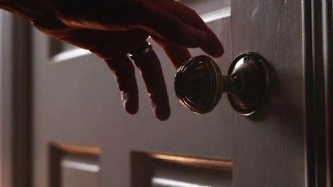 Hand Reaching for Door Knob Stockbeeldmateriaal 328068268