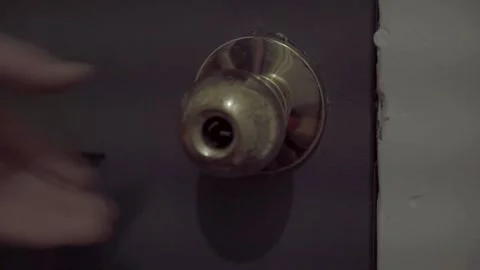 Hand reaching For Doorknob From Inside Stock Footage 248107262