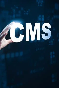 Hand reaching out to touch the letters CMS in a tech-focused digital environment Stock Photos