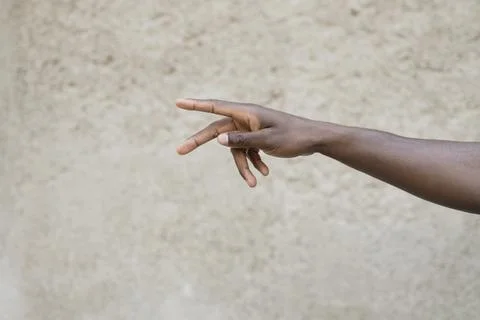 Hand Reaching Out in Trust Stock Photos