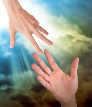 Hand reaching for safety help in clouds Stock Photos