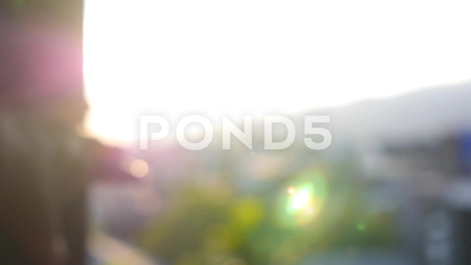 Hand Reaching the Sun and Sky. Unfocused | Stock Video | Pond5