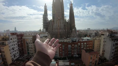 Hand Reaching Toward Iconic Architecture in Urban Landscape Stock Footage 314059498