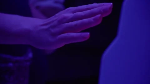 Hand reaching towards heater for warmth Stock Footage 292876763