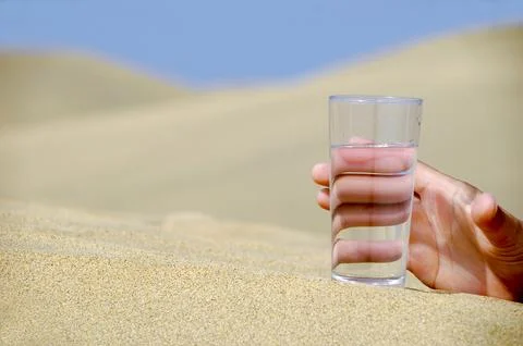Hand reaching for water Stock Photos