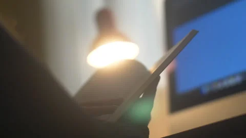 Hand Reading Book Backlight Warm Close Behind Shot Stock Footage 279593019