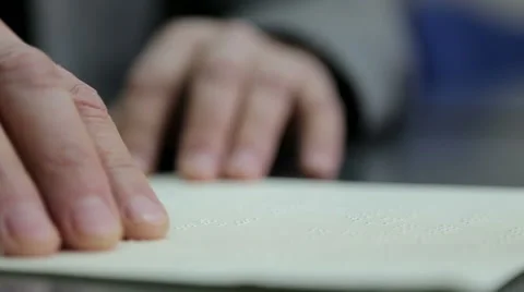 Hand reading Braille Stock Footage 44771193